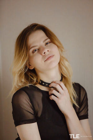 Natural beauty Crystal Maiden in stockings and lingerie with a butt plug