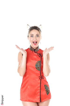 Blonde cutie Cara Mell unbuttons a red Chinese dress