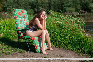 Gorgeous brunette Luna Pica strips and flaunts her curvy booty