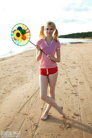 Teen Candy Bloom with Pigtails showing her nice slightly furry beaver