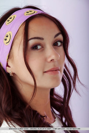 Sexy thin brunette Veselin with tanned body undresses and poses nude in washroom