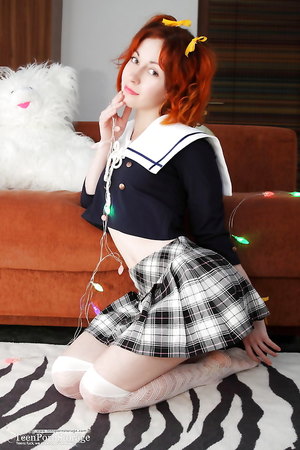 Cute redhead Night A slowly takes off her clothes to reveal her amazing body