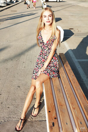 Slim blonde beauty Nancy A messes around while stretching pussy in public