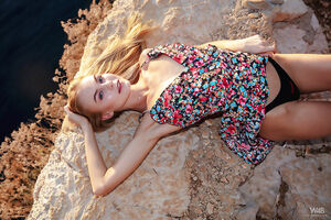 Slim blonde beauty Nancy A messes around while stretching pussy in public