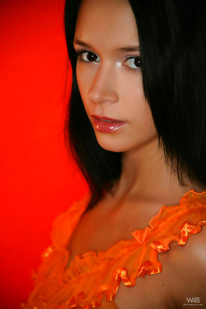 Beautiful dark haired Gwen adores showing off her fabulous body