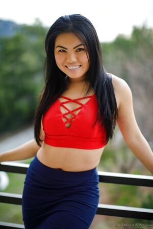 Petite brunette Cindy Starfall treats the neighbors with a public striptease