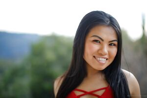 Petite brunette Cindy Starfall treats the neighbors with a public striptease