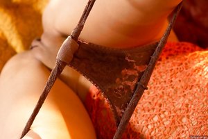 Asian Mila Jade strips naked on bed and flashes her pussy