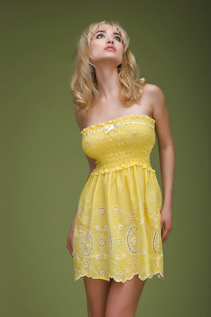 Perfectly shaped blonde Lia with big tits and hot ass showing slender figure